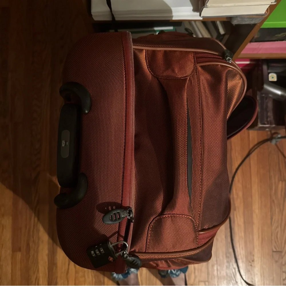 Tumi Rolling Garment Bag in Burnt Orange